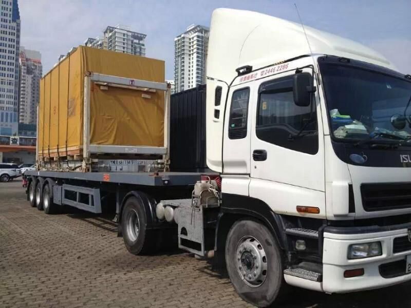 中港平板車(chē)運(yùn)輸與港口貨物裝卸搬運(yùn) 高效聯(lián)動(dòng)保障跨境物流暢通